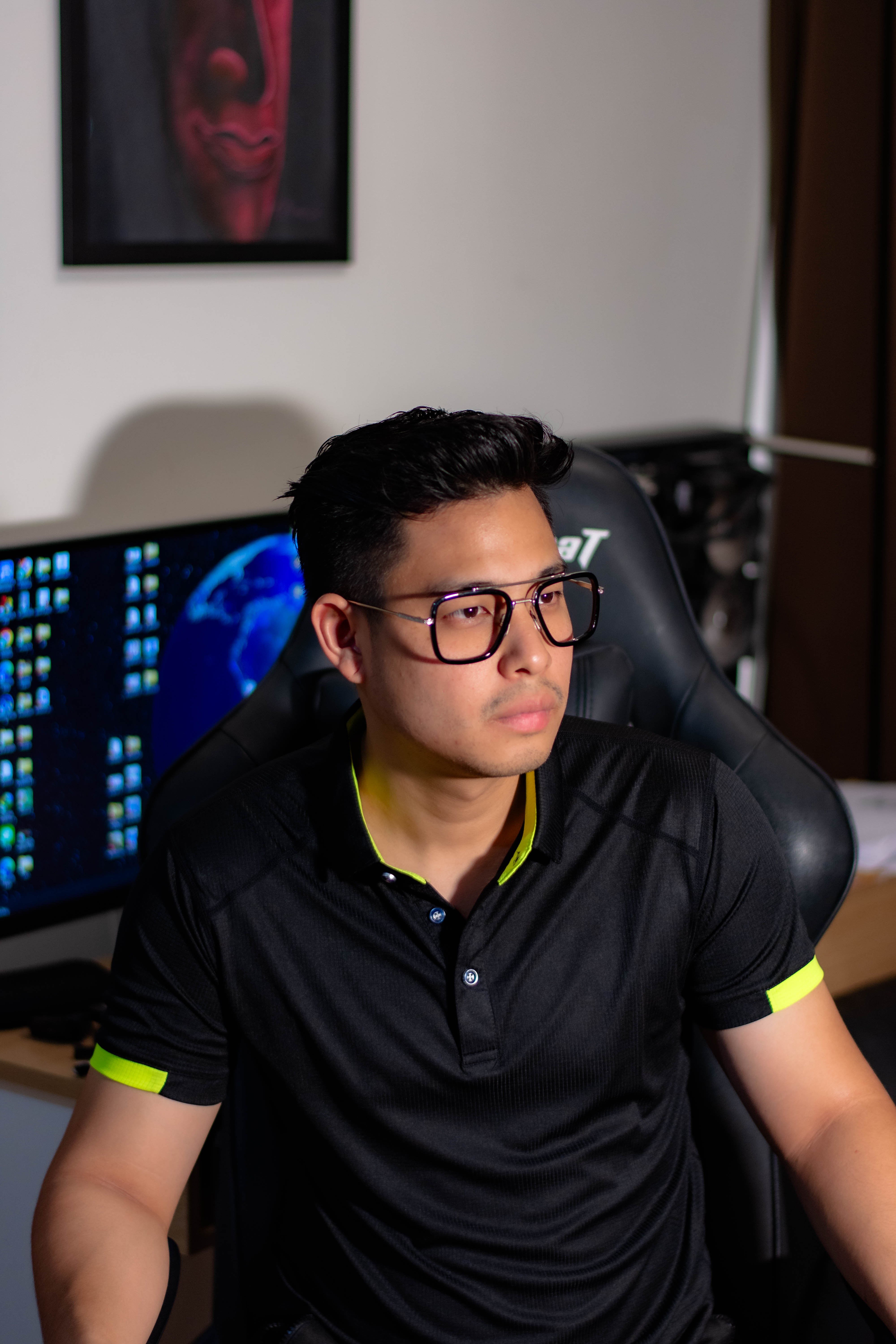 Portrait of the Human author seated at a workstation.